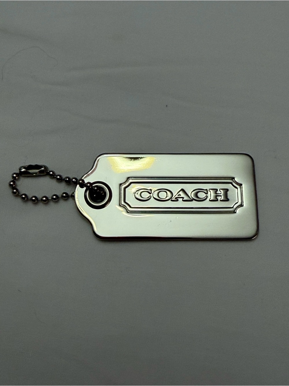 COACH Silver Tone Metal Hang Tag Charm Key Chain Fob. Like New